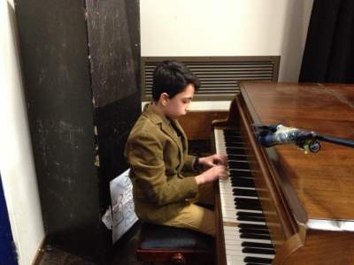 Hadaf Student playing Piano